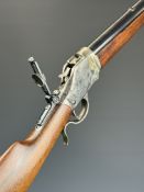 Uberti Winchester Model 1886 style .45-70 underlever-action falling block rifle with storage