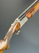 Nikko Model 5000 II 12 bore over and under ejector shotgun with engraved locks, trigger guard,