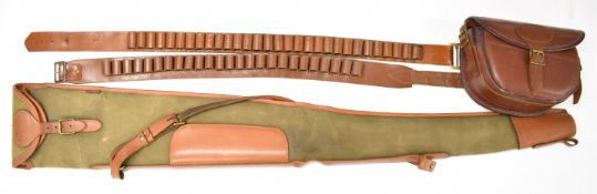 Leather and canvas shotgun or rifle slip, leather shotgun cartridge bag and two 12 bore cartridge