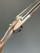 Westley Richards 12 bore side by side ejector shotgun with named locks, chequered grip and horn