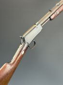 Winchester Model 62 .22 pump-action rifle with adjustable sights and 23 inch octagonal barrel,