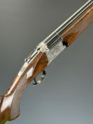 Franchi 12 bore over under ejector shotgun with engraved scenes of birds to the locks, named and