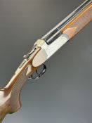 Maroccini Breda B4 12 bore over and under shotgun with engraved scenes of dogs and birds to the
