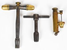 Three gun tools comprising James Dixon & Sons nipple primer, nipple key with nipple pricker and