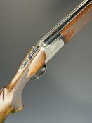 Lanber 12 bore over and under ejector shotgun with engraved locks, underside, trigger guard, top