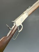 Rossi .38/ .357 underlever-action repeating carbine rifle with adjustable sights, wooden stock and