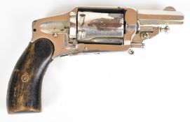 5.5mm Velo-Dog six-shot pocket revolver with shaped wooden grips, folding trigger, fluted cylinder