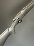 CZ 452-2E ZKM .22 bolt-action rifle with composite stock, semi-pistol grip, raised cheek piece,