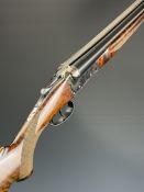 AYA Yeoman 12 bore side by side shotgun with chequered semi-pistol grip and beaver tail forend,