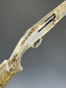 Revo Matrix 12 bore semi-automatic shotgun with Mossyoak Duck Blind finish, chequered semi-pistol