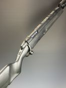 Steyr Scout .243 bolt-action rifle with composite stock, semi-pistol grip, multi-shot magazine,