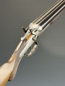 Harold & Smith of London 12 bore side by side hammer action shotgun with engraved scenes of birds to