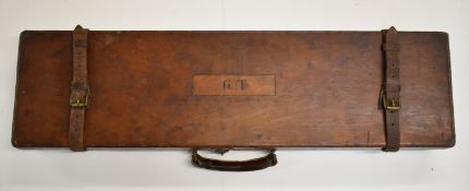 Leather bound shotgun carry case with fitted interior and 'Churchill (Gunmakers) Ltd Builders of
