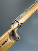 Walther .22 bolt-action target rifle with shaped and textured thumb-hole grip, adjustable trigger,
