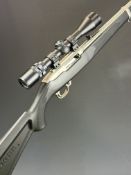 Ruger Model 10/22 .22 semi-automatic rifle with named composite stock, chequered semi-pistol grip,