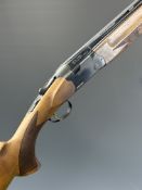 ATA 20 bore over and under shotgun with chequered semi-pistol grip and forend, vented top rib and 28