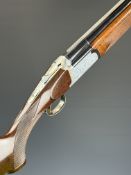 Browning Medallist Sporter 12 bore over and under ejector shotgun with named and ornately engraved