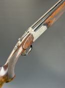 Rizzini 20 bore over and under ejector shotgun with scenes of birds to the engraved action and