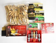 A collection of 7mm rifle cartridges and re-loading equipment comprising 20 Hornady Superperformance