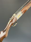 Browning 525 Grade 6 .410 over and under ejector shotgun with gold inlaid dogs and birds to the