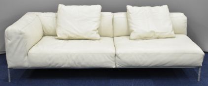 B&B Italia designer Italian leather sofa raised on tubular steel legs, with name stamped to the