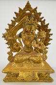 Bronze figure of the Hindu deity Tara, with removable rear surround, H19cm
