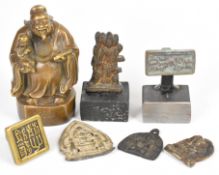 Chinese and Indian bronze and iron figures and seals, tallest 13cm