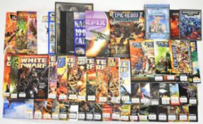 A collection of Games Workshop Warhammer and Warhammer 40K related rulebooks, catalogues and