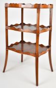 Three tier burr wood cake stand or small buffet with shaped gallery edges, raised on four splayed