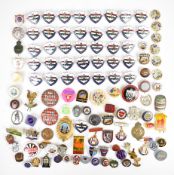 Collection of over one hundred gilt metal and enamel badges and medals, many vintage, to include