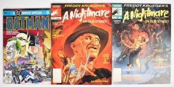 Three Marvel and DC film related comic books comprising A Nightmare on Elm Street and Batman.