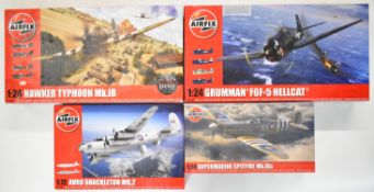 Four Airfix 1:24 scale plastic model aircraft kits comprising Supermarine Spitfire Mk.IXc A17001,