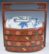 Chinese lacquer four division dowry, wedding or nesting box with floral decoration and likely