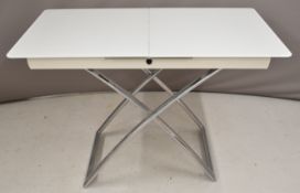 Calligariss designer glass and chrome extendable office or dining table raised on X supports, W115 x