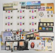 Collection of GB presentation packs, UM stamps and first day covers together with world stamps, GB