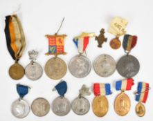 Collection of fifteen various commemorative medals and coins including a Russian 300 years of the