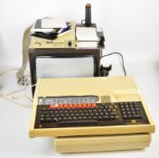 BBC Master Series microcomputer by Acorn Computers Ltd, together with monitor, floppy disc drive,
