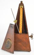 Mahogany cased Maelzel's metronome manufactured by Thomas Piggott, with original retailer's label to