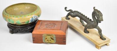 Chinese brass dragon on wooden stand, cloisonné pedestal dish on stand and a jewellery box,