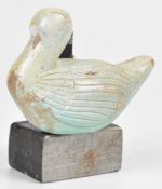 Egyptian faience figure of a duck, mounted on a metal plinth, H10cm