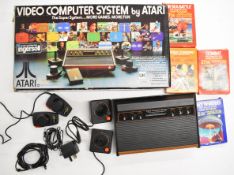 Atari CX-2600 video Computer System with four games to include Missile Command, Combat, Air Sea