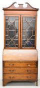 19th century mahogany bureau bookcase, the top having twin astragal glazed doors and saw tooth