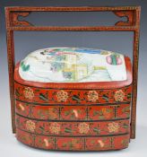 Chinese lacquer four division dowry, wedding or nesting box with floral decoration and likely
