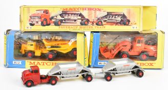Three Matchbox diecast model haulage and construction vehicles comprising Fruehauf Hopper Train M-4,