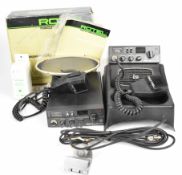 Two Rotel RVC-230 forty channel CB radios, one in original box with instructions and accessories.