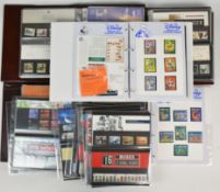 A collection of Disney stamps in two pre-printed albums with miniature sheets and short sets,