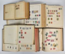 All world collection of stamps in four Imperial stamp albums and an Ideal album, also album sheets