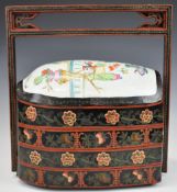 Chinese lacquer four division dowry, wedding or nesting box with floral decoration and likely