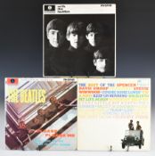 Two early Beatles LPs and a Spencer Davis Group LP. With The Beatles (PMC 1206) with triple flip