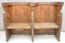 Victorian Gothic Revival oak twin seat with extensive moulded decoration, W167 x D48 x H115cm